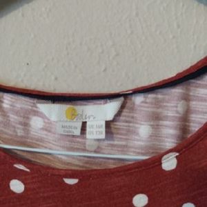 Orange and white polka dot dress